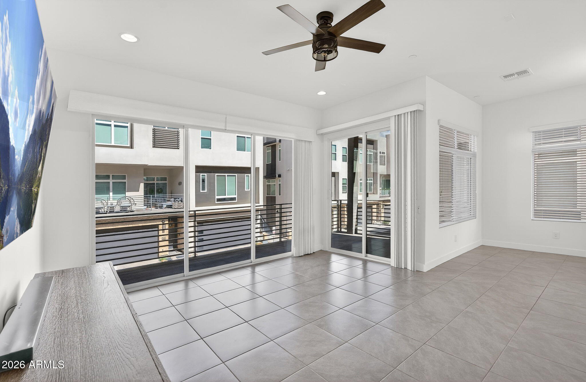 6850 East McDowell Road, Unit 14 Scottsdale, AZ 85257 - Photo 17 of 48 Living Room with Balcony Access