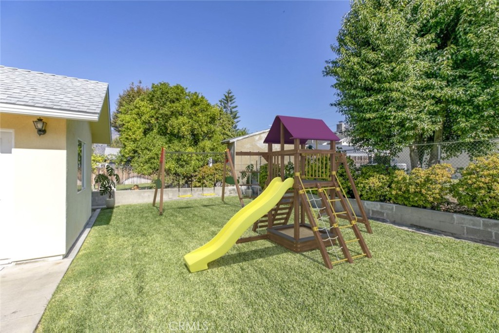 10404 Leolang Avenue Sunland, CA 91040 - Photo 21 of 37 a view of a backyard with a slide