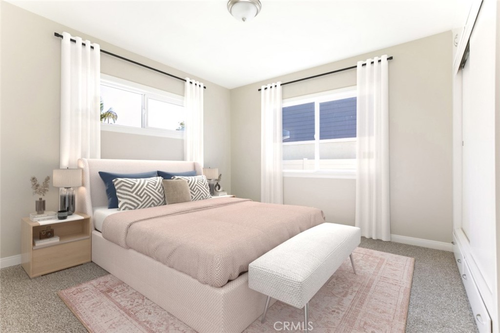 10404 Leolang Avenue Sunland, CA 91040 - Photo 9 of 37 a bedroom with a large bed and a window