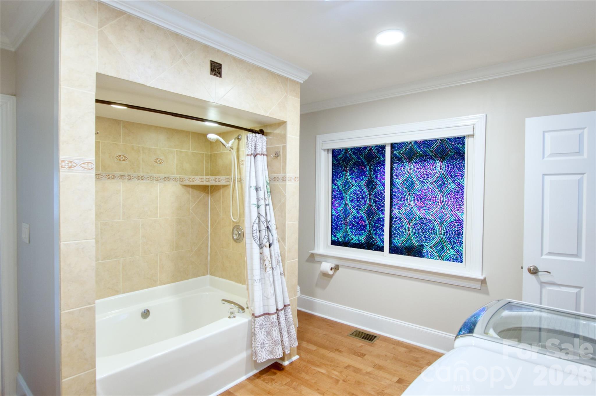 204 Clinton Avenue Clover, SC 29710 - Photo 15 of 26 a bathroom with a granite countertop tub sink and mirror