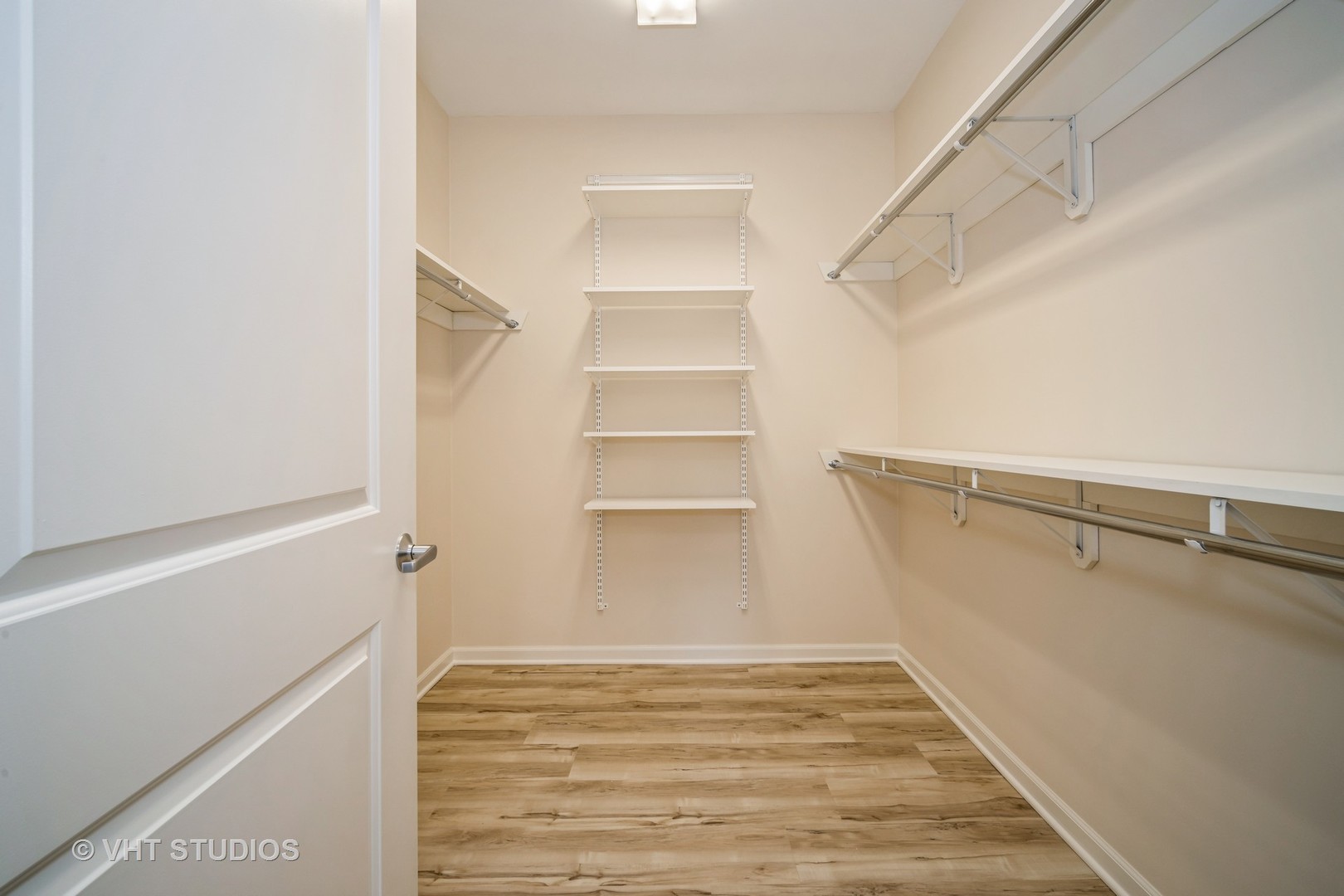 2220 Founders Way, Unit P102 Northbrook, IL 60062 - Photo 14 of 23 a view of walk in closet with empty racks