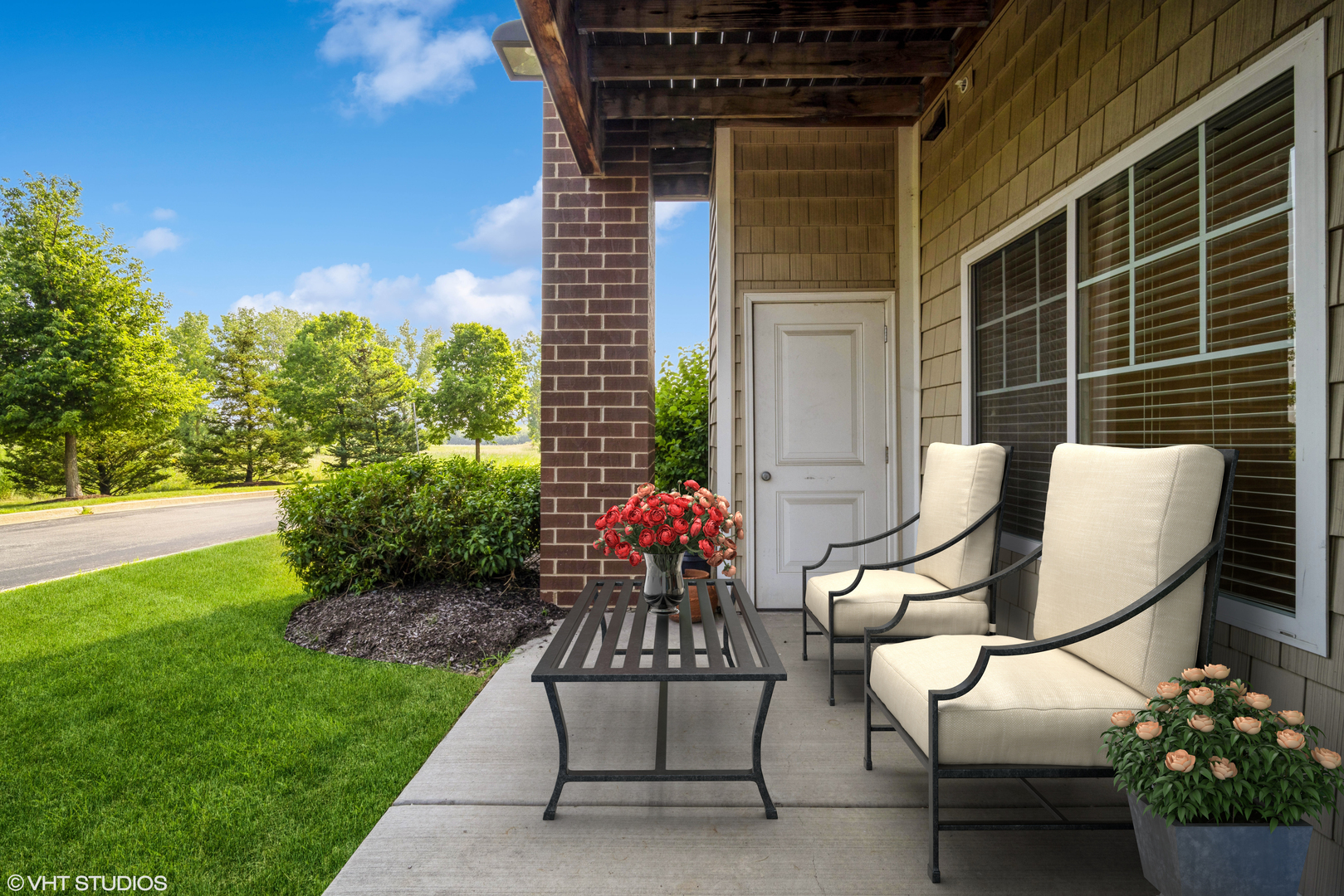 2220 Founders Way, Unit P102 Northbrook, IL 60062 - Photo 22 of 23 a view of a chairs and table in the back yard of the house
