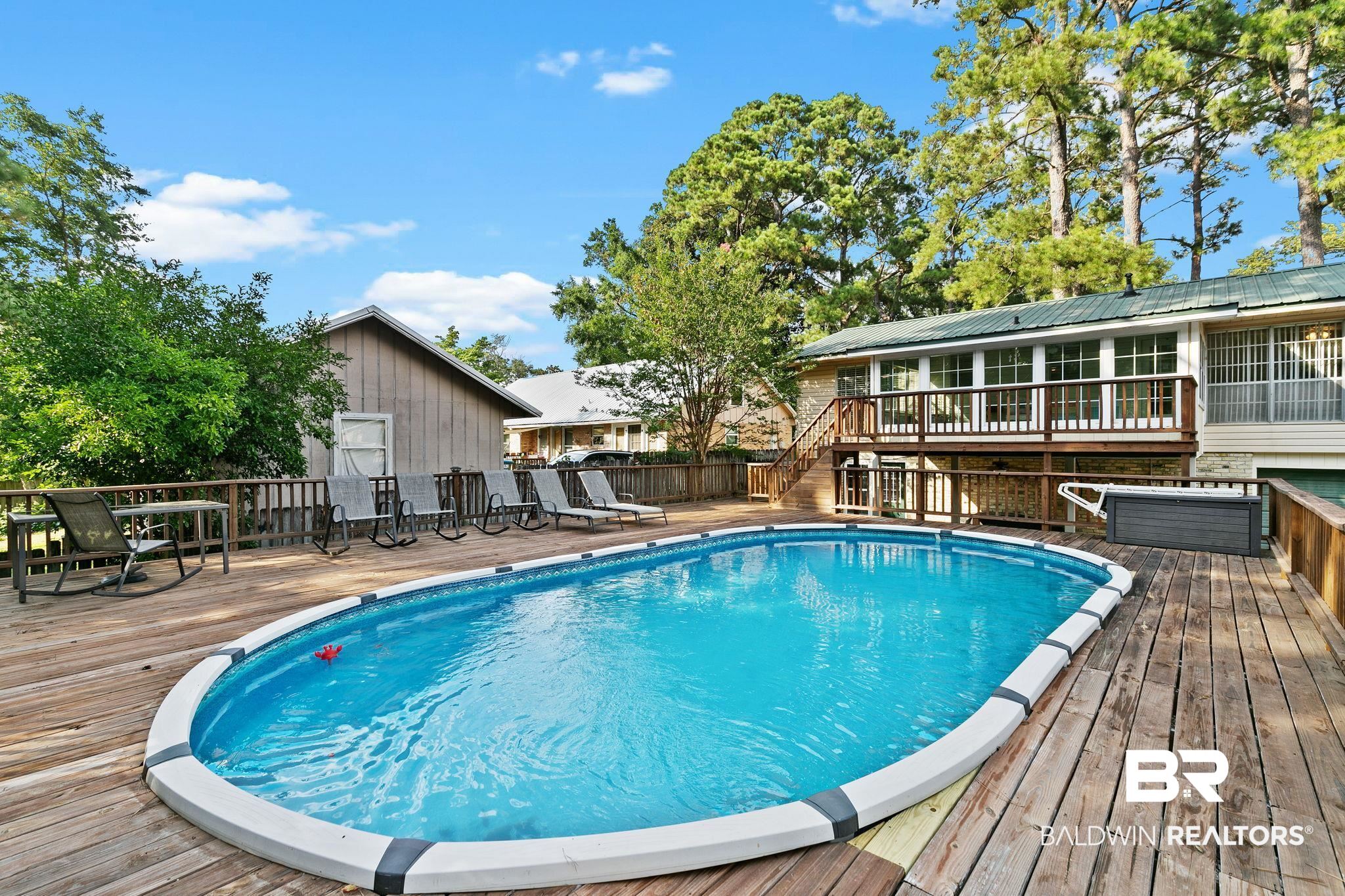 14 Lee Circle Daphne, AL 36527 - Photo 66 of 83 View of swimming pool featuring a deck