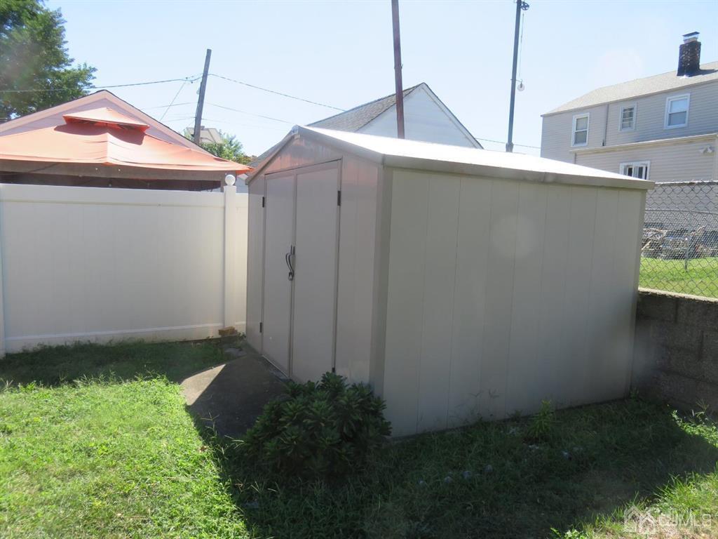 367 Eagle Avenue Perth Amboy, NJ 08861 - Photo 25 of 25 a backyard of a house with lots of green space