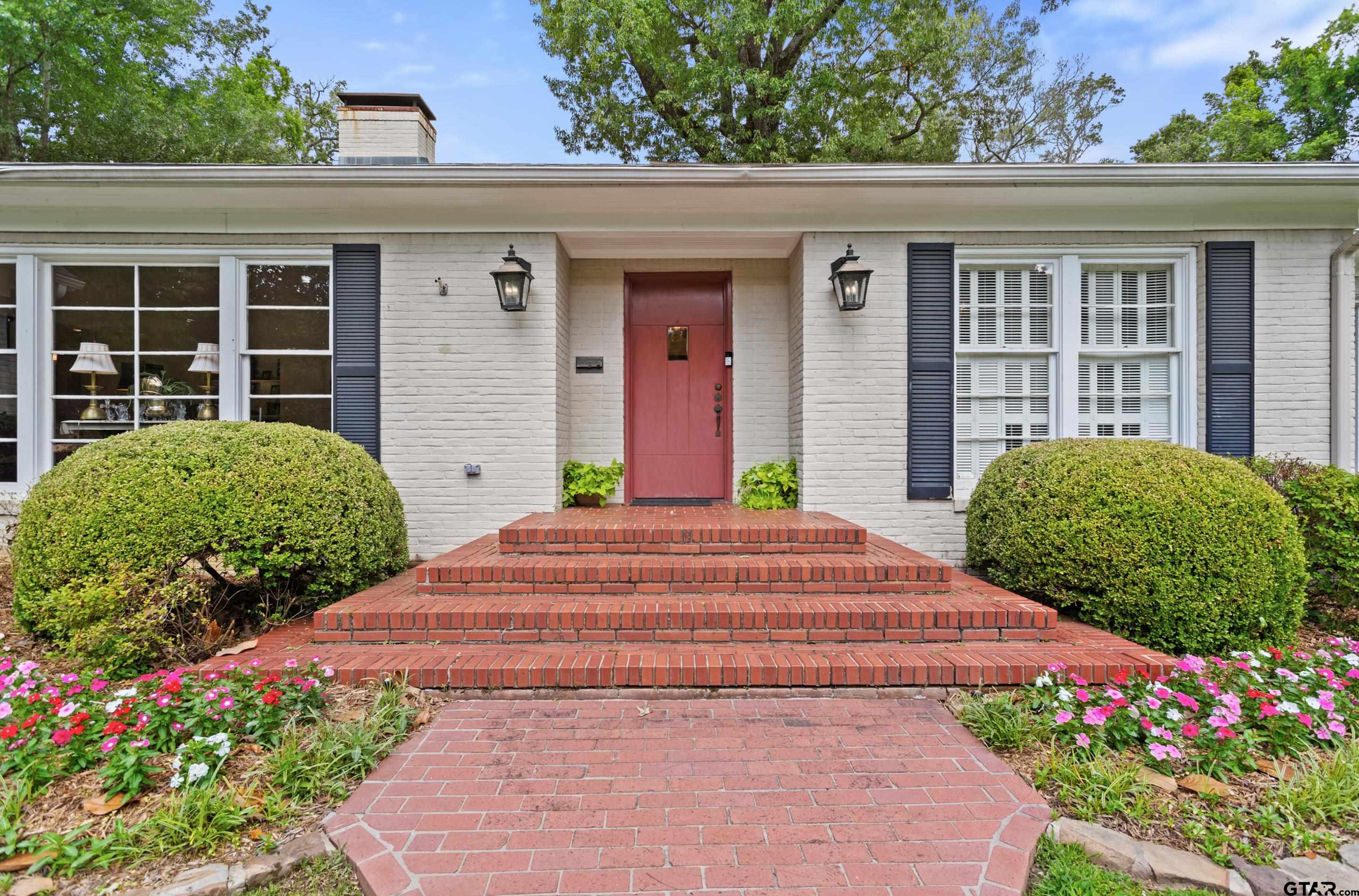 2631 Old Bullard Road Tyler, TX 75701 - Photo 3 of 43 a front view of a house with garden