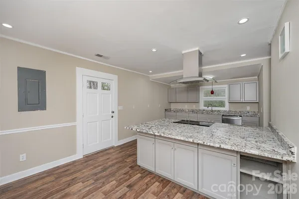 a bathroom with a granite countertop sink