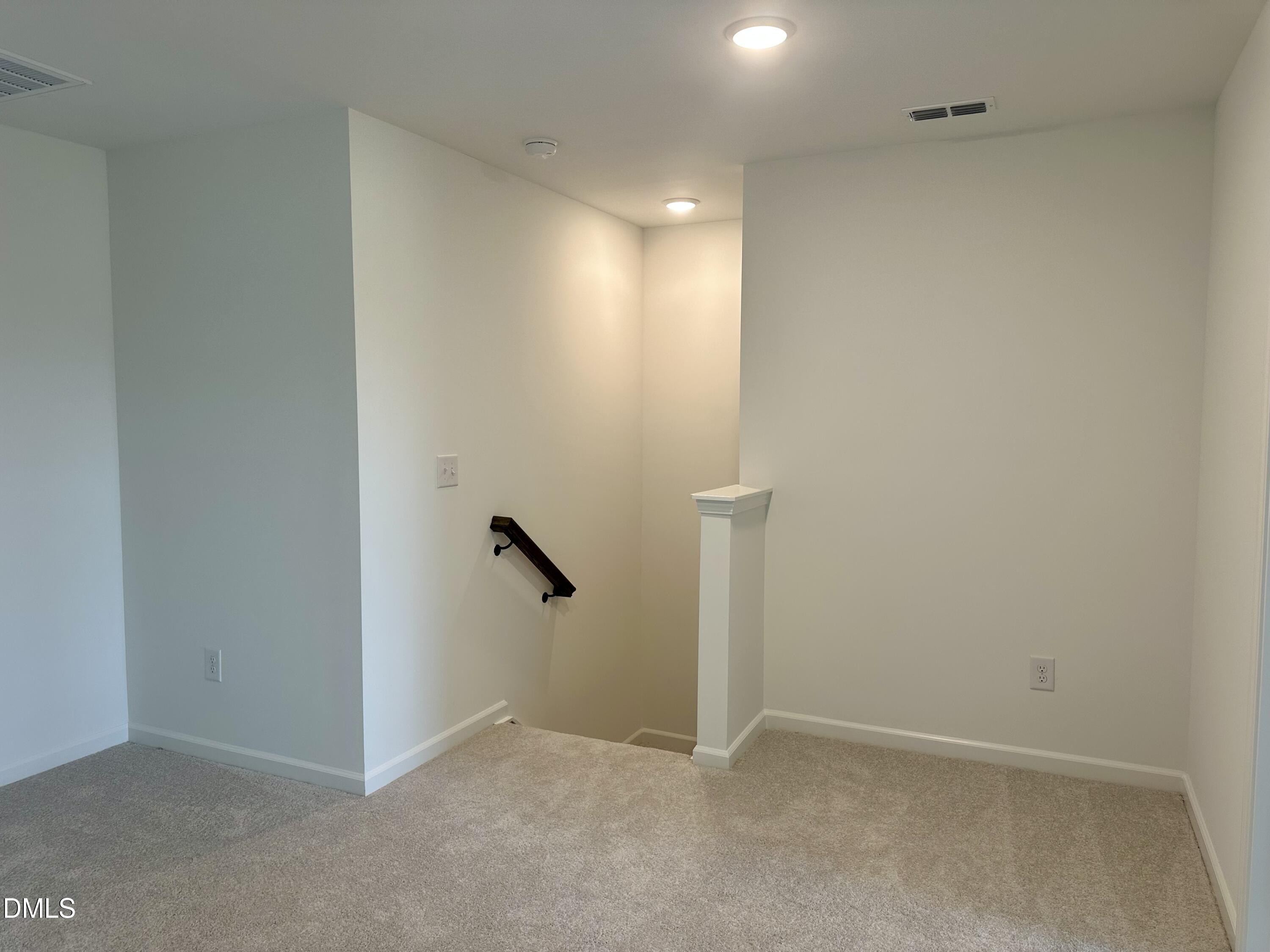 1526 Mirth Court Rolesville, NC 27571 - Photo 16 of 34 an empty room with a shower