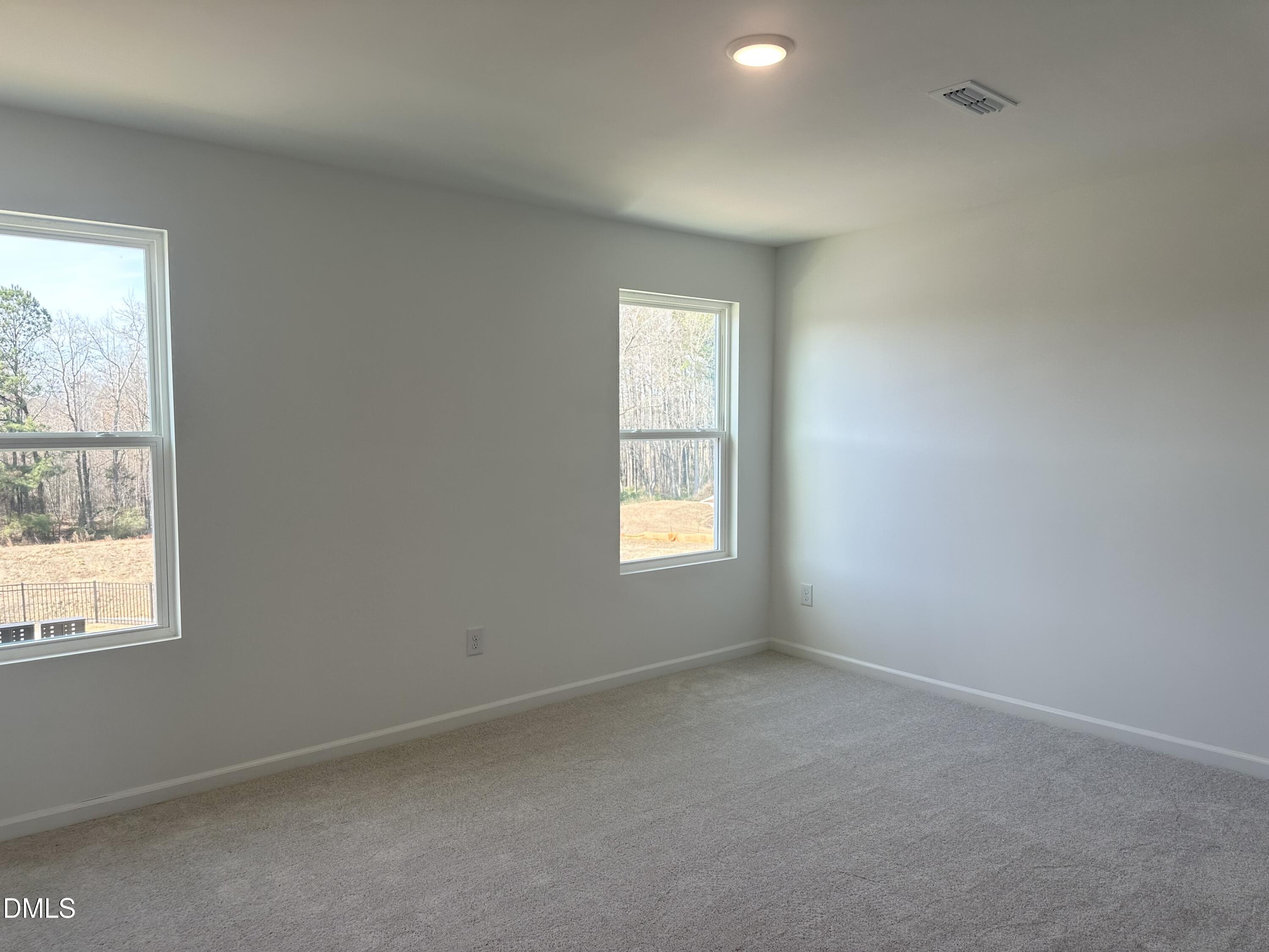 1526 Mirth Court Rolesville, NC 27571 - Photo 22 of 34 an empty room with a window