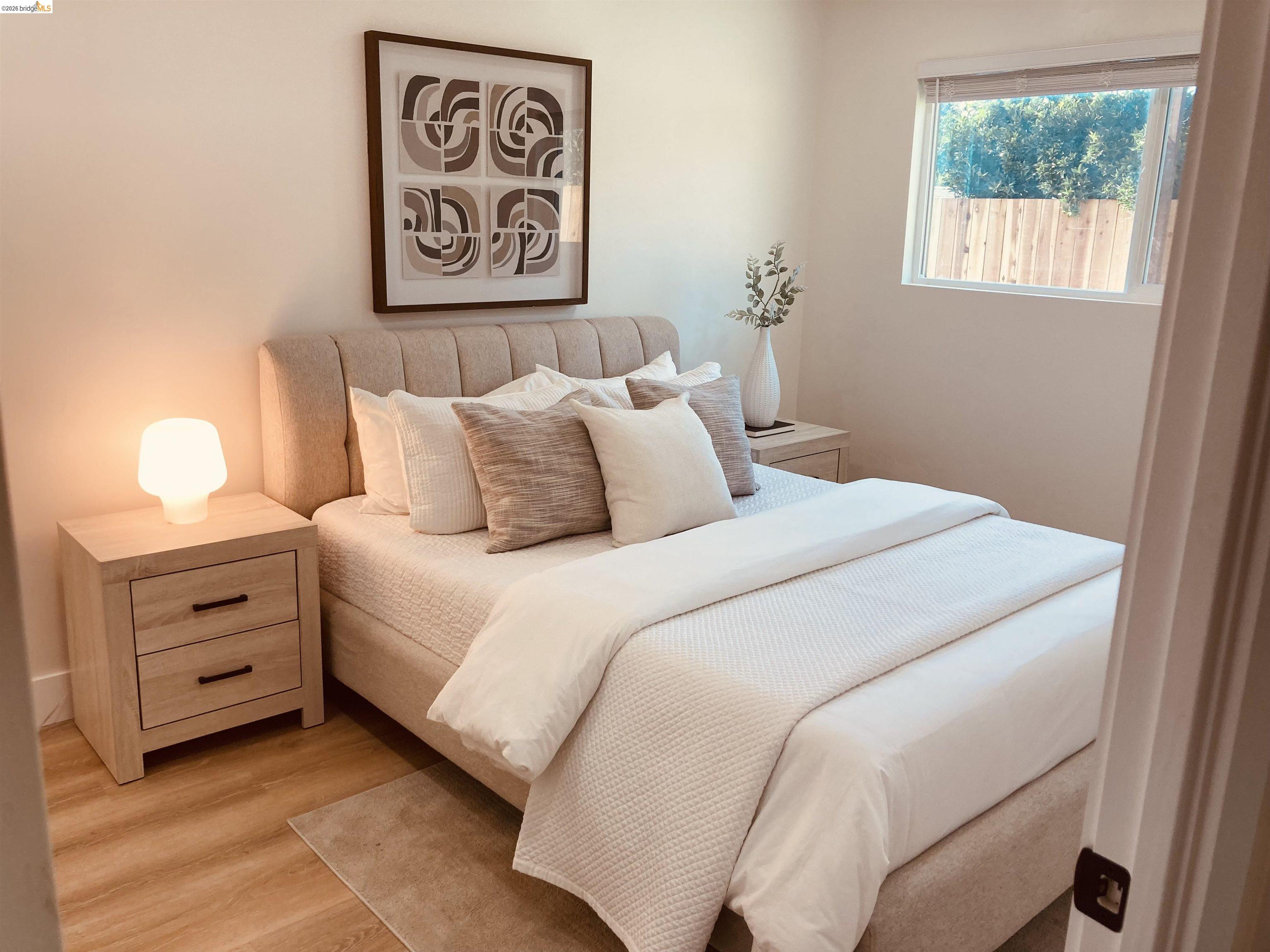 375 Senter Road San Jose, CA 95111 - Photo 51 of 80 a bedroom with a bed and a window