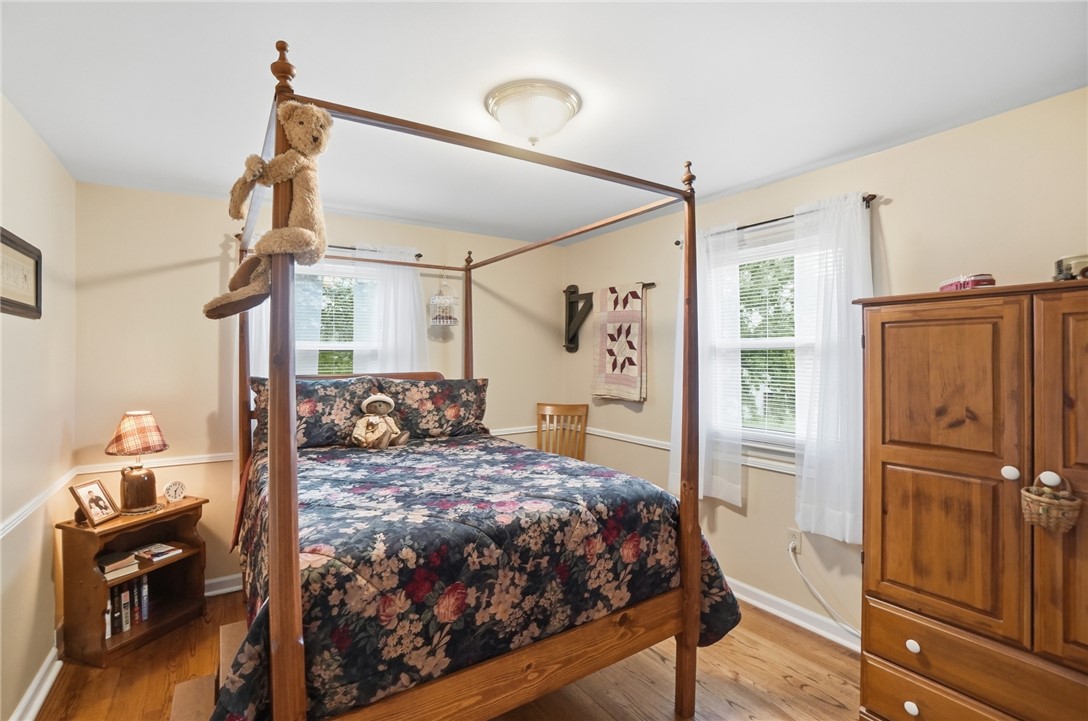 4170 Johnson Road Springfield, OH 45502 - Photo 40 of 54 Hardwood floors and generous natural illumination define this cheerful bedroom.