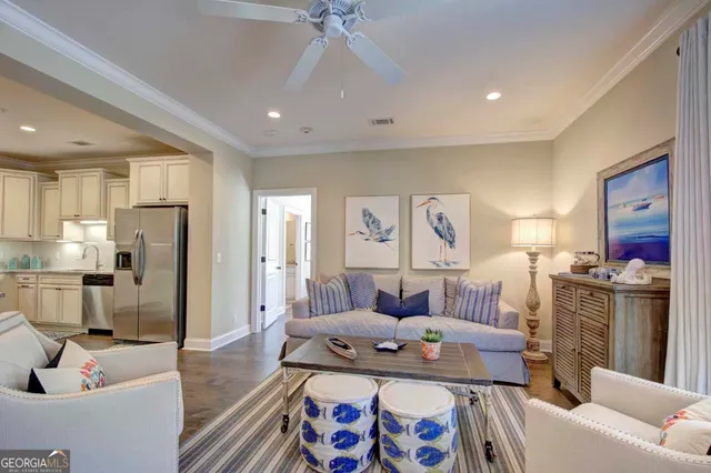 a living room with furniture and a table