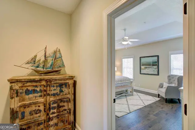 a view of a livingroom with furniture and a window