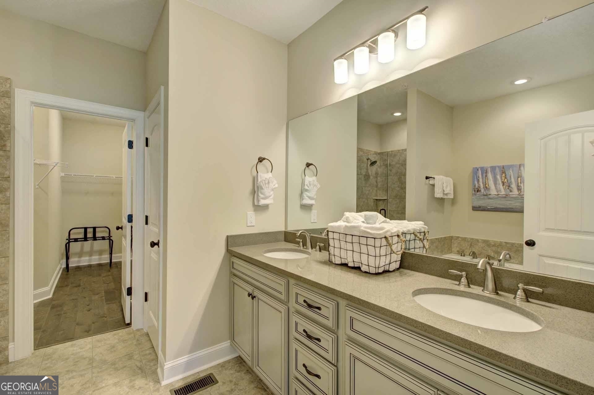 205 Mariners Circle St. Simons, GA 31522 - Photo 26 of 51 a bathroom with a granite countertop double vanity sink mirror and