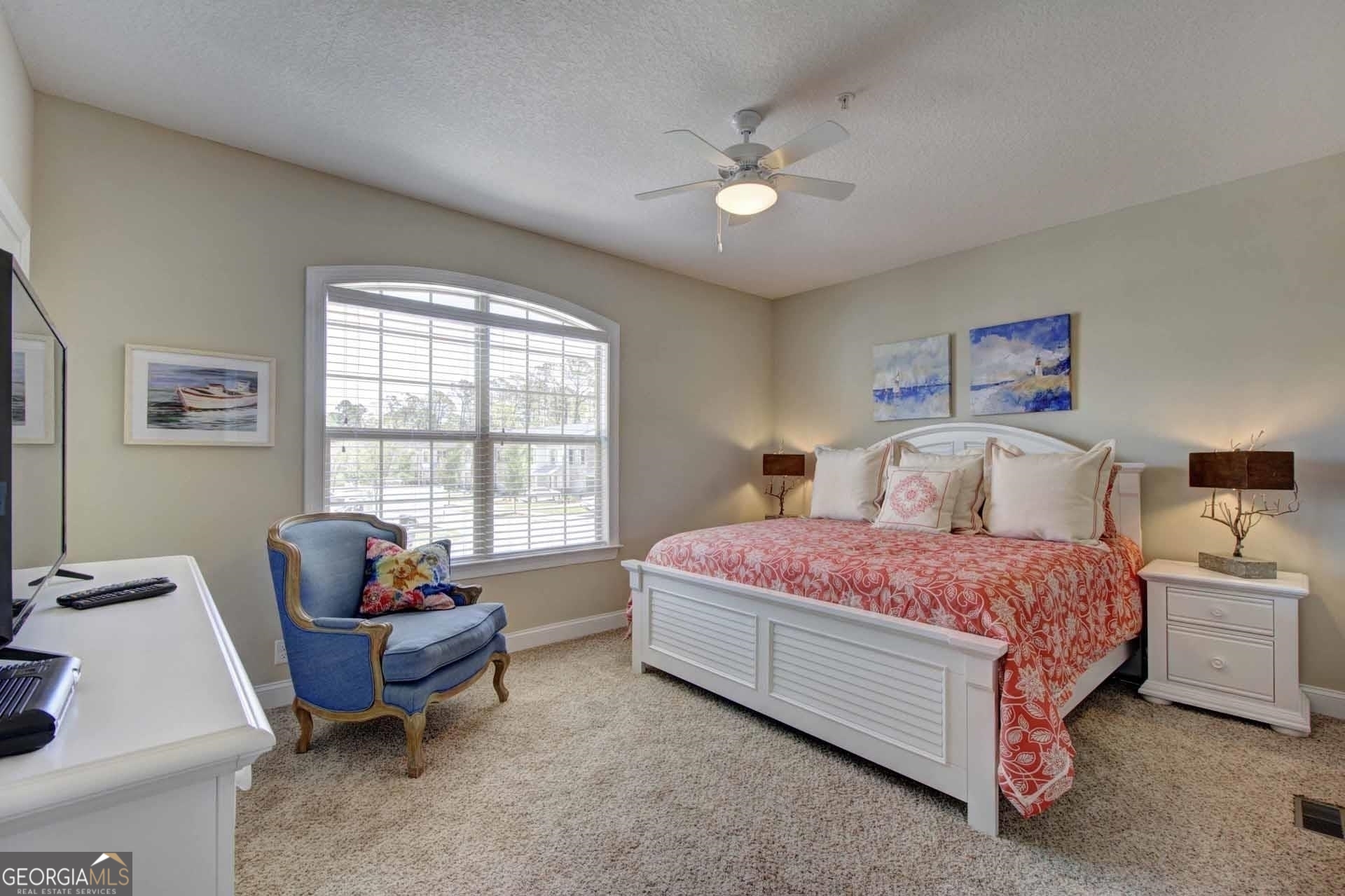 205 Mariners Circle St. Simons, GA 31522 - Photo 31 of 51 a bedroom with a bed and window