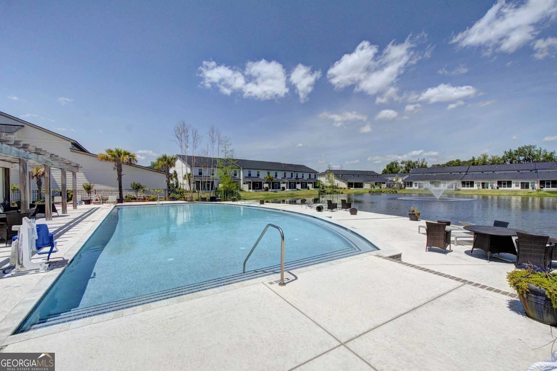 205 Mariners Circle St. Simons, GA 31522 - Photo 38 of 51 a view of a swimming pool