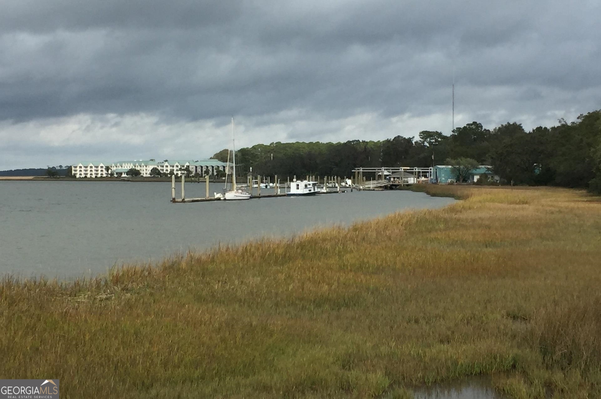 205 Mariners Circle St. Simons, GA 31522 - Photo 47 of 51 a view of an ocean with city