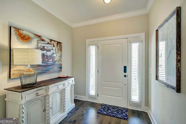 a kitchen with stainless steel appliances granite countertop a stove and a refrigerator