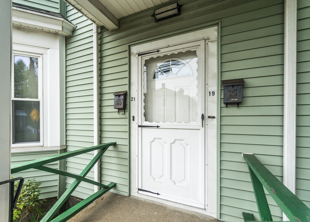 21 Gardner Street, Unit 1 Waltham, MA 02453 - Photo 2 of 19 a view of a door and a window