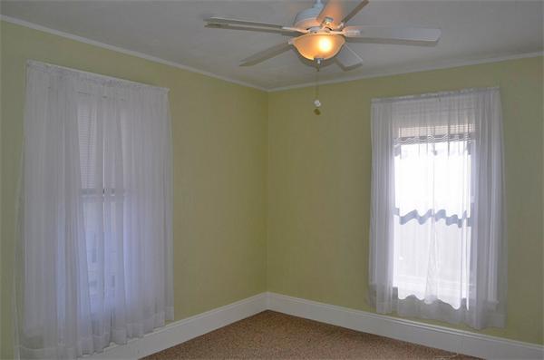 28 Washington Square Gloucester, MA 01930 - Photo 12 of 26 a view of empty room with window