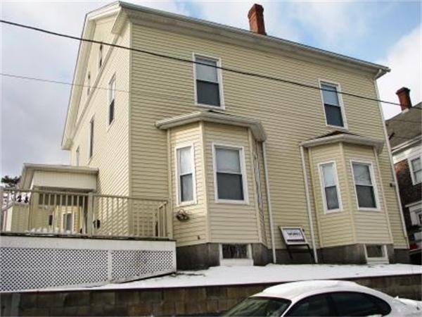 28 Washington Square Gloucester, MA 01930 - Photo 20 of 26 a view of a house with a small deck