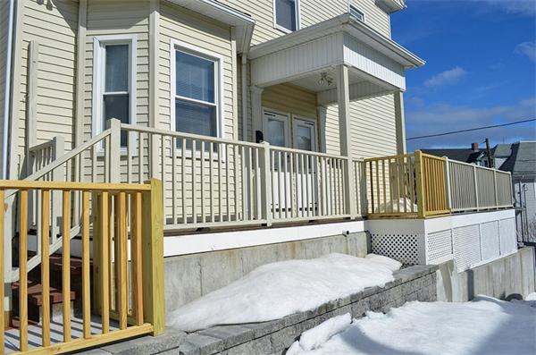 28 Washington Square Gloucester, MA 01930 - Photo 25 of 26 a view of a chair and table in the balcony