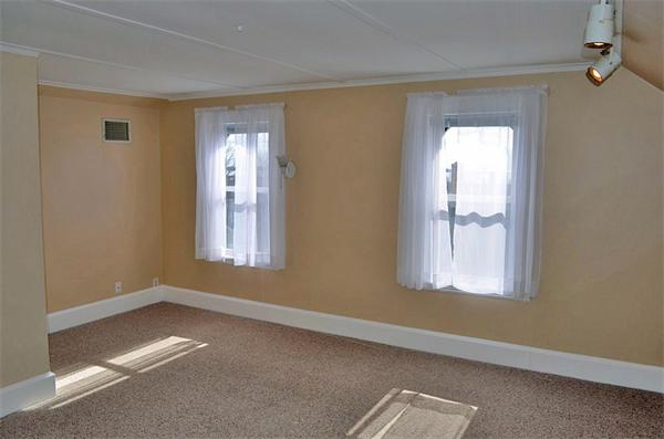 28 Washington Square Gloucester, MA 01930 - Photo 26 of 26 a view of an empty room with a window