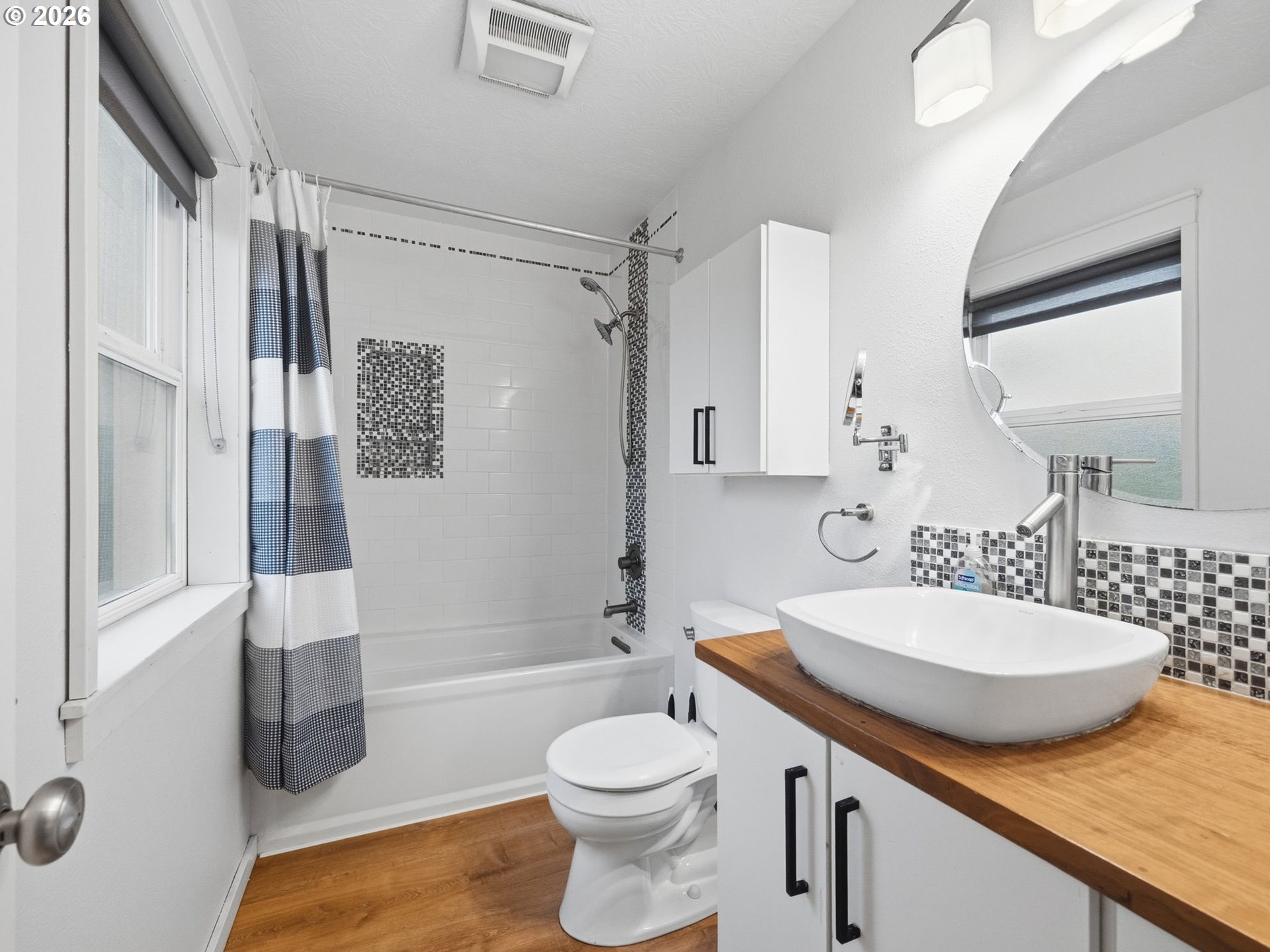 92085 Akerstedt Road Astoria, OR 97103 - Photo 18 of 48 a bathroom with a granite countertop sink toilet and shower