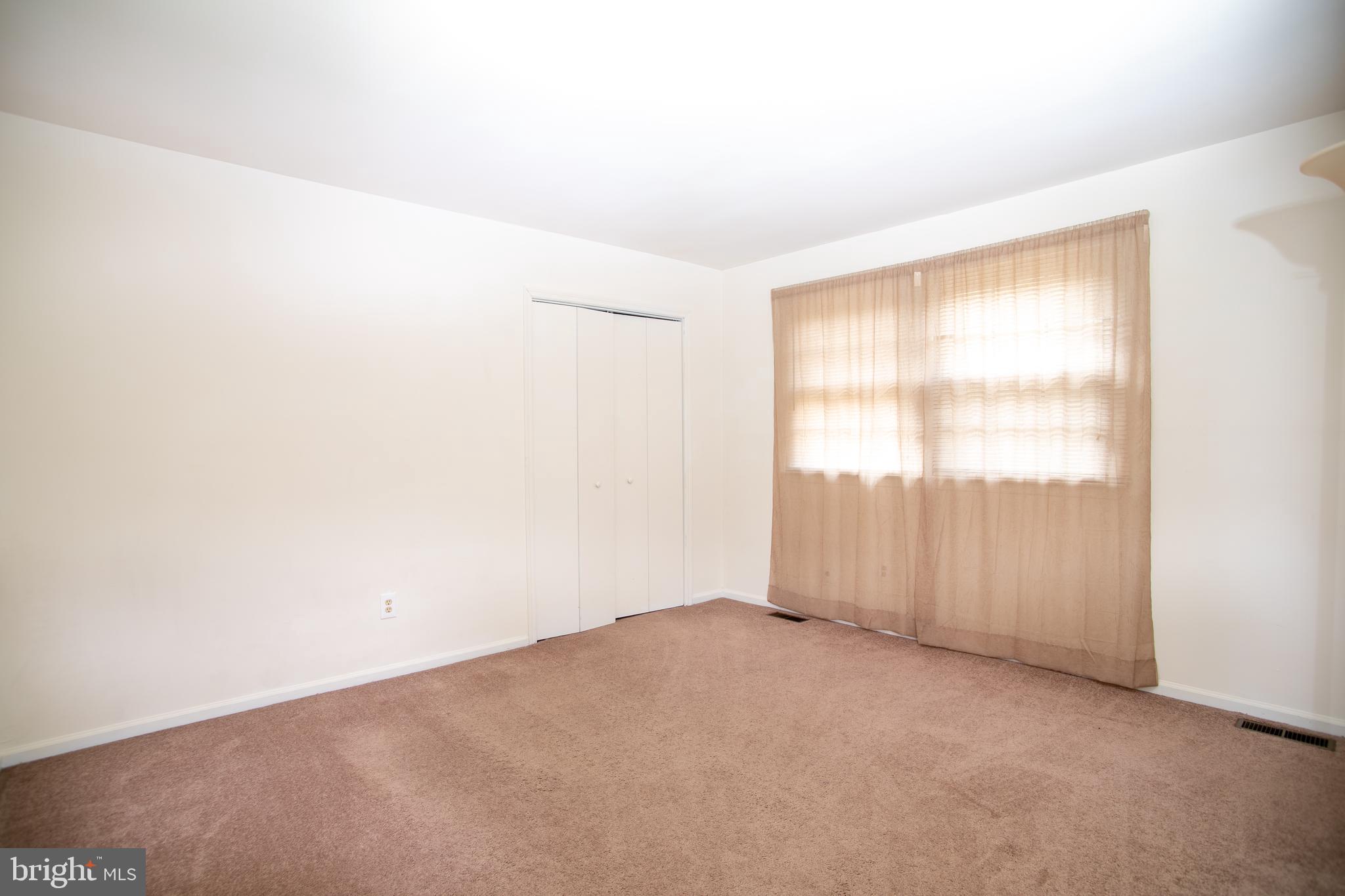 613 New York Road Glassboro, NJ 08028 - Photo 23 of 27 an empty room with a window
