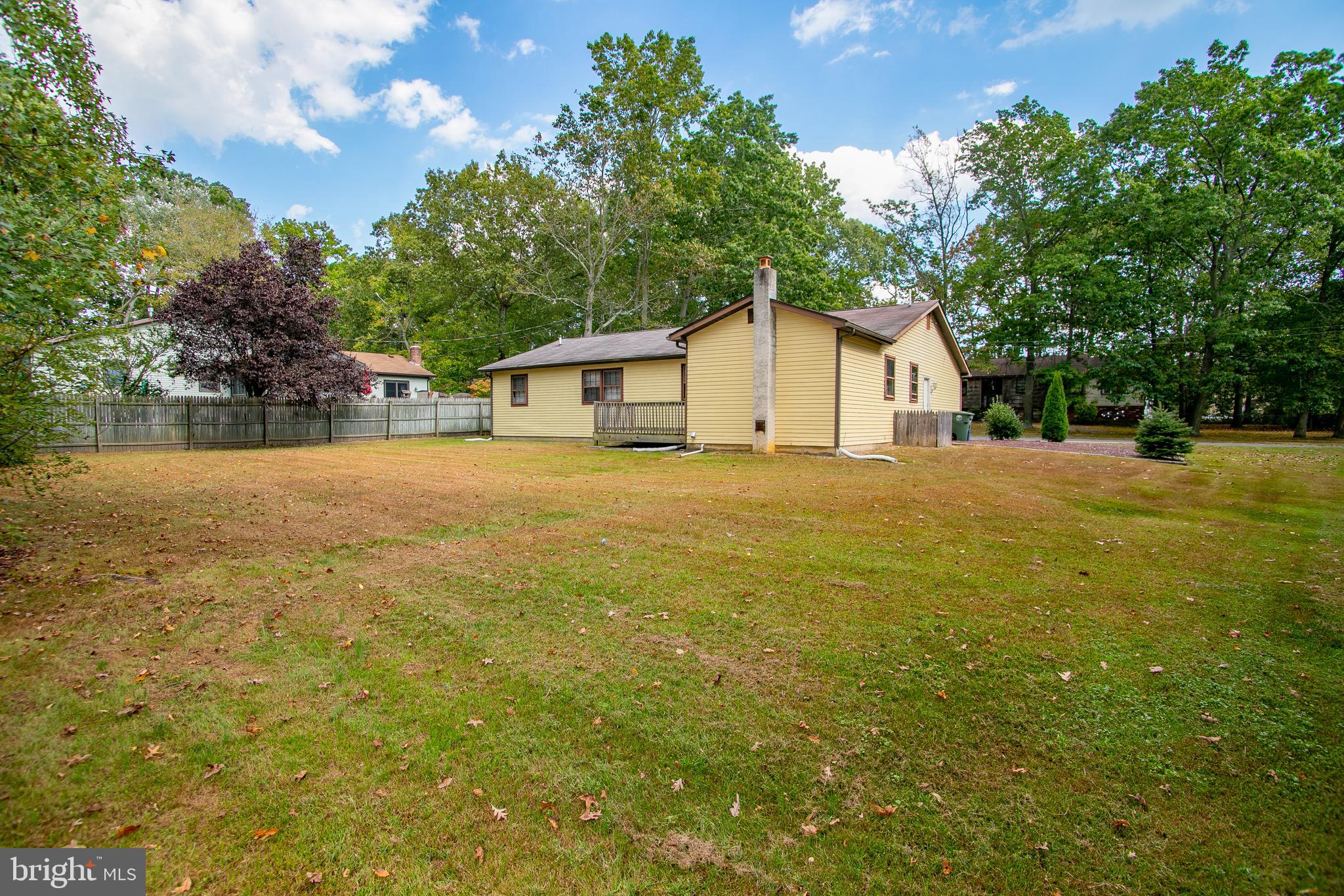 613 New York Road Glassboro, NJ 08028 - Photo 4 of 27 a view of a house with a yard
