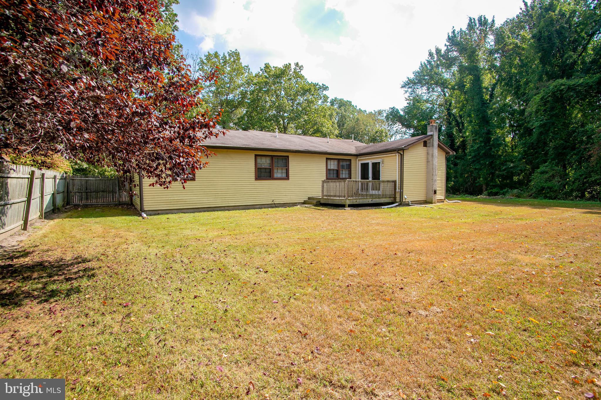 613 New York Road Glassboro, NJ 08028 - Photo 5 of 27 a view of a house with a yard