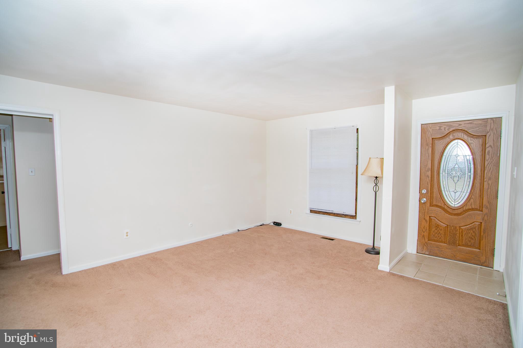 613 New York Road Glassboro, NJ 08028 - Photo 10 of 27 a view of an empty room with window