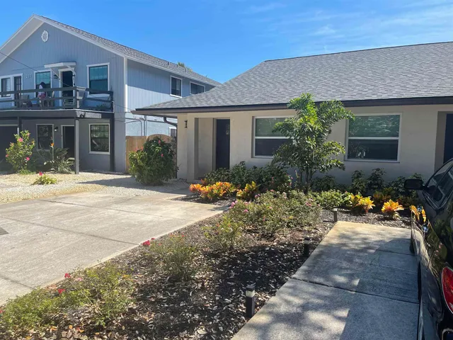 a front view of house with yard