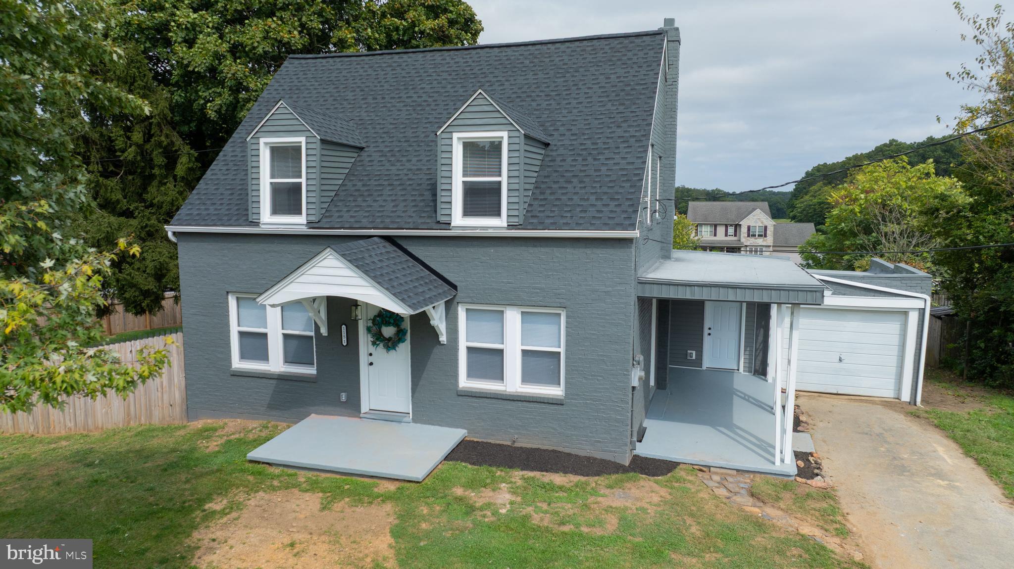 1151 Delta Road Red Lion, PA 17356 - Photo 2 of 44 a front view of a house with a yard