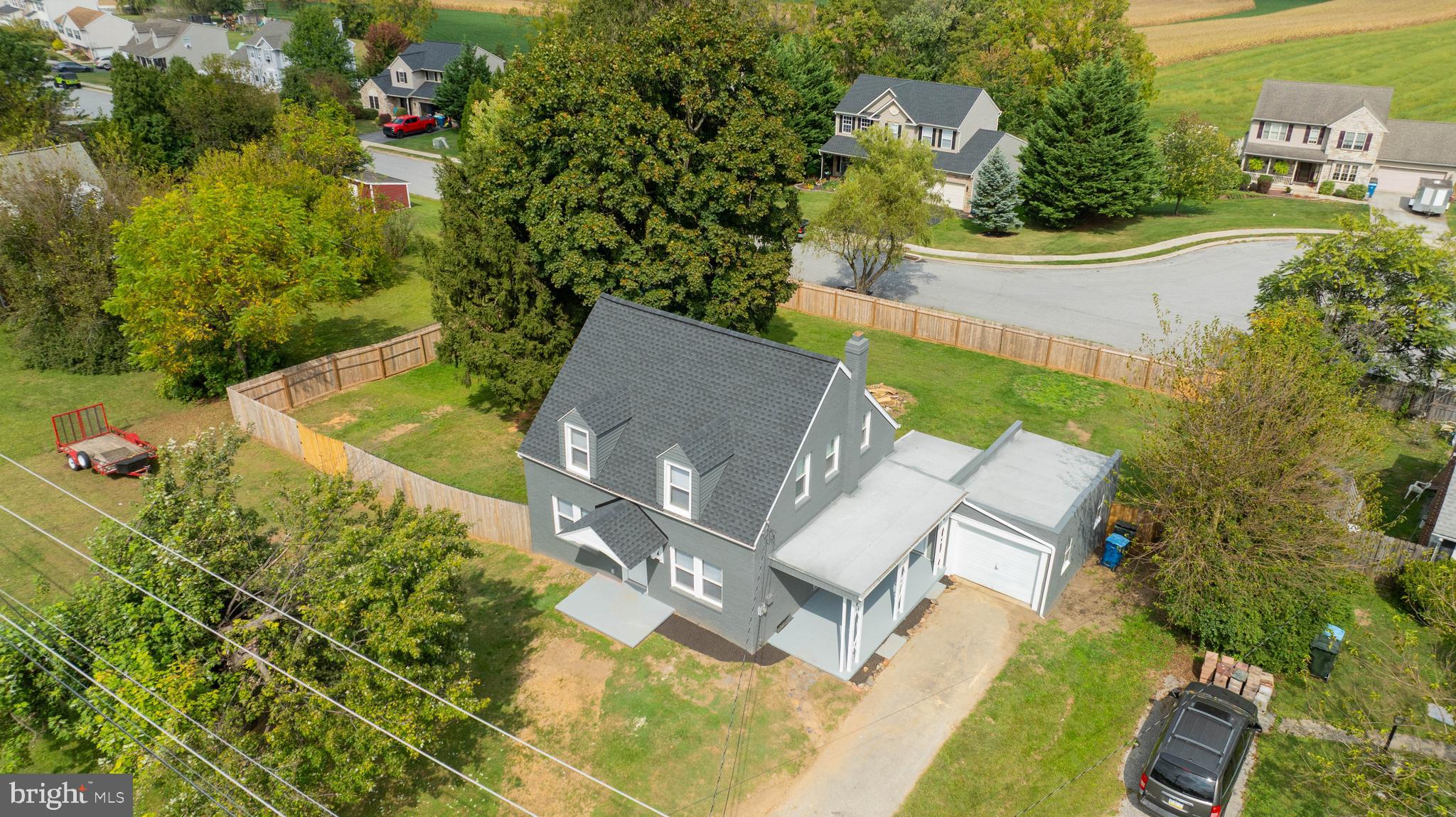 1151 Delta Road Red Lion, PA 17356 - Photo 38 of 44 an aerial view of a house with a yard basket ball court and outdoor seating