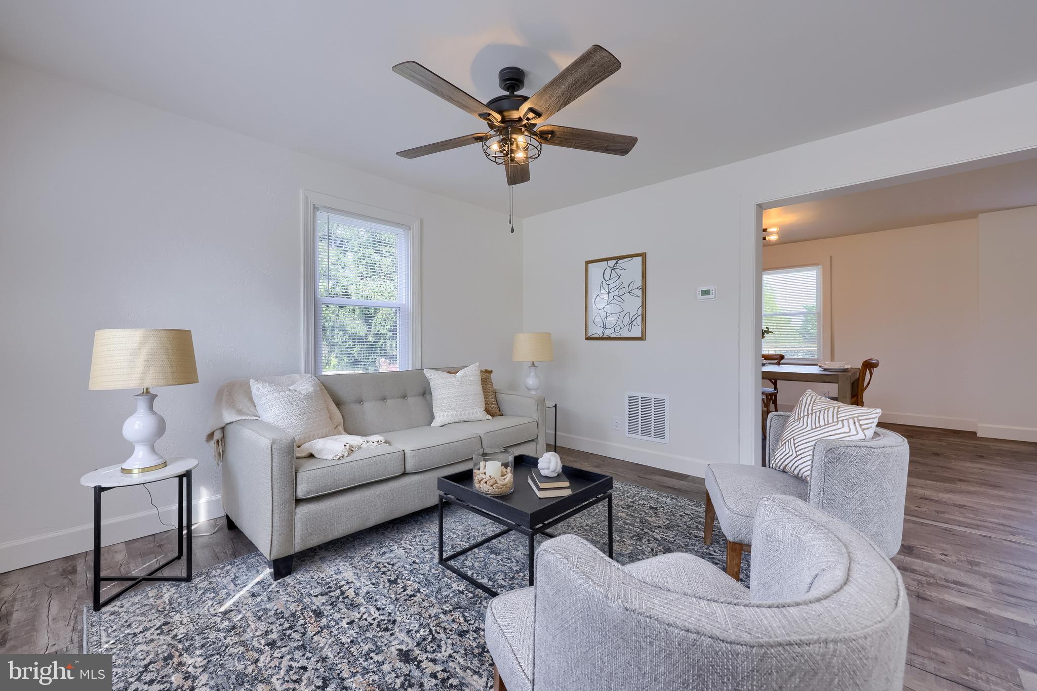 1151 Delta Road Red Lion, PA 17356 - Photo 4 of 44 a living room with furniture and a ceiling fan