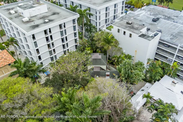 a view of a buildings with plants