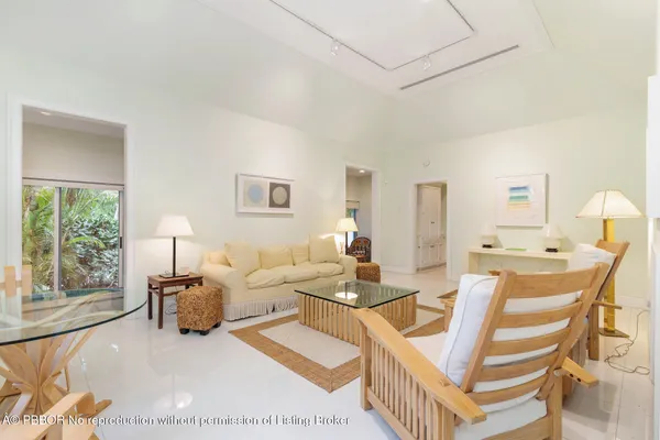 a living room with a couch and a large window