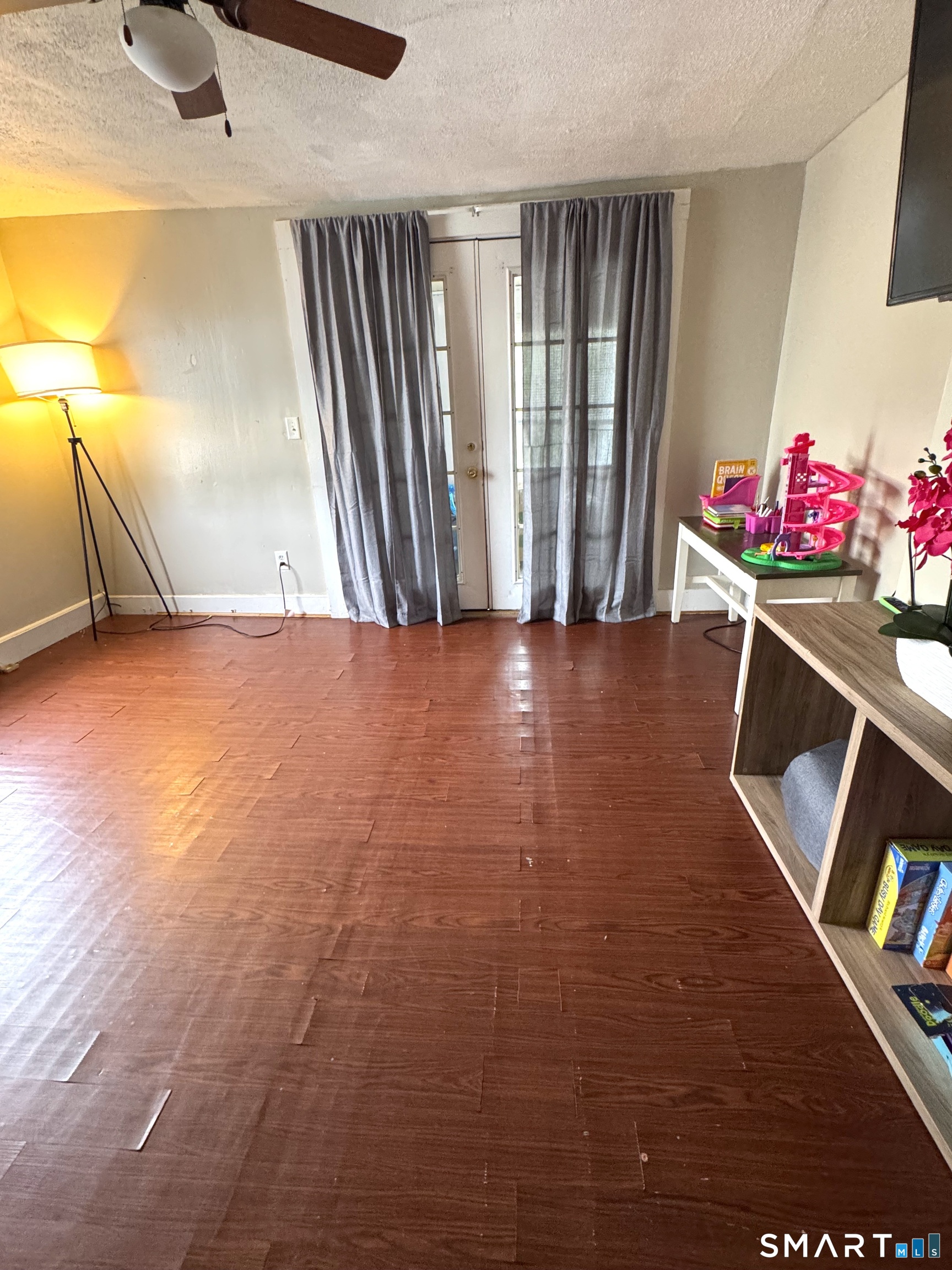6-8 Vose Street Ansonia, CT 06401 - Photo 28 of 37 2nd floor living room with french doors that lead to bonus rm