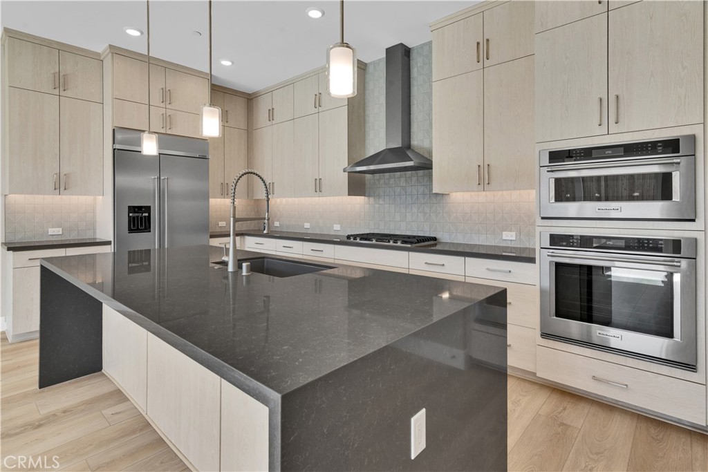 1330 Cava Road Paso Robles, CA 93446 - Photo 2 of 14 a kitchen with kitchen island a counter top a stove and a sink with granite countertops