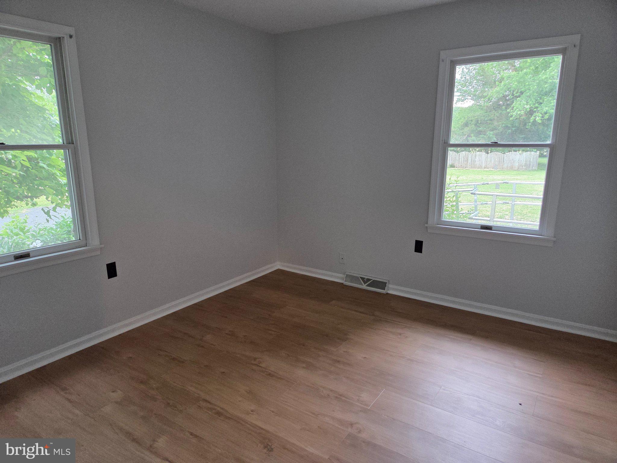 1378 Woodlytown Road Magnolia, DE 19962 - Photo 8 of 15 an empty room with a window
