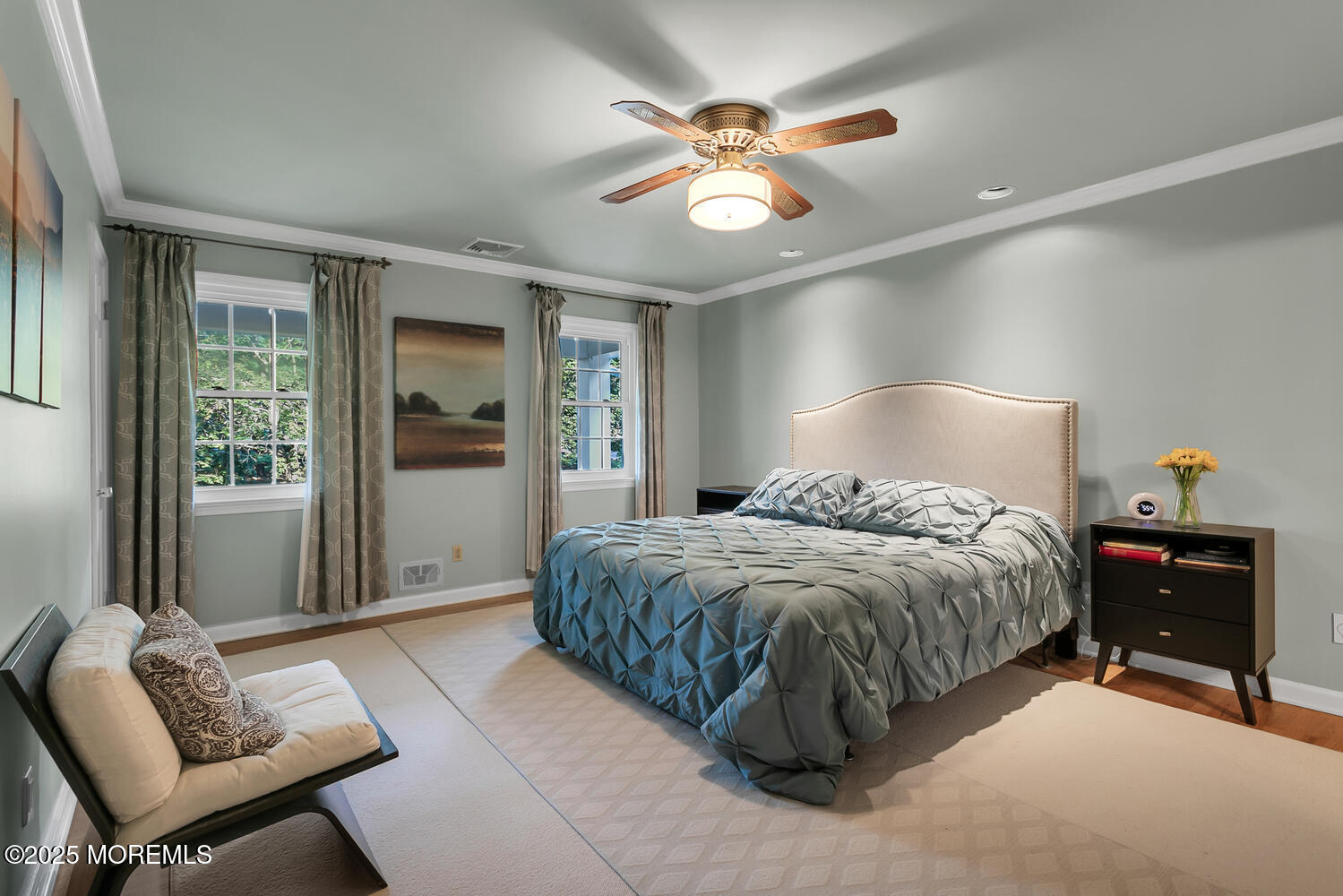 5 Page Drive Red Bank, NJ 07701 - Photo 13 of 27 a spacious bedroom with a bed and a chandelier