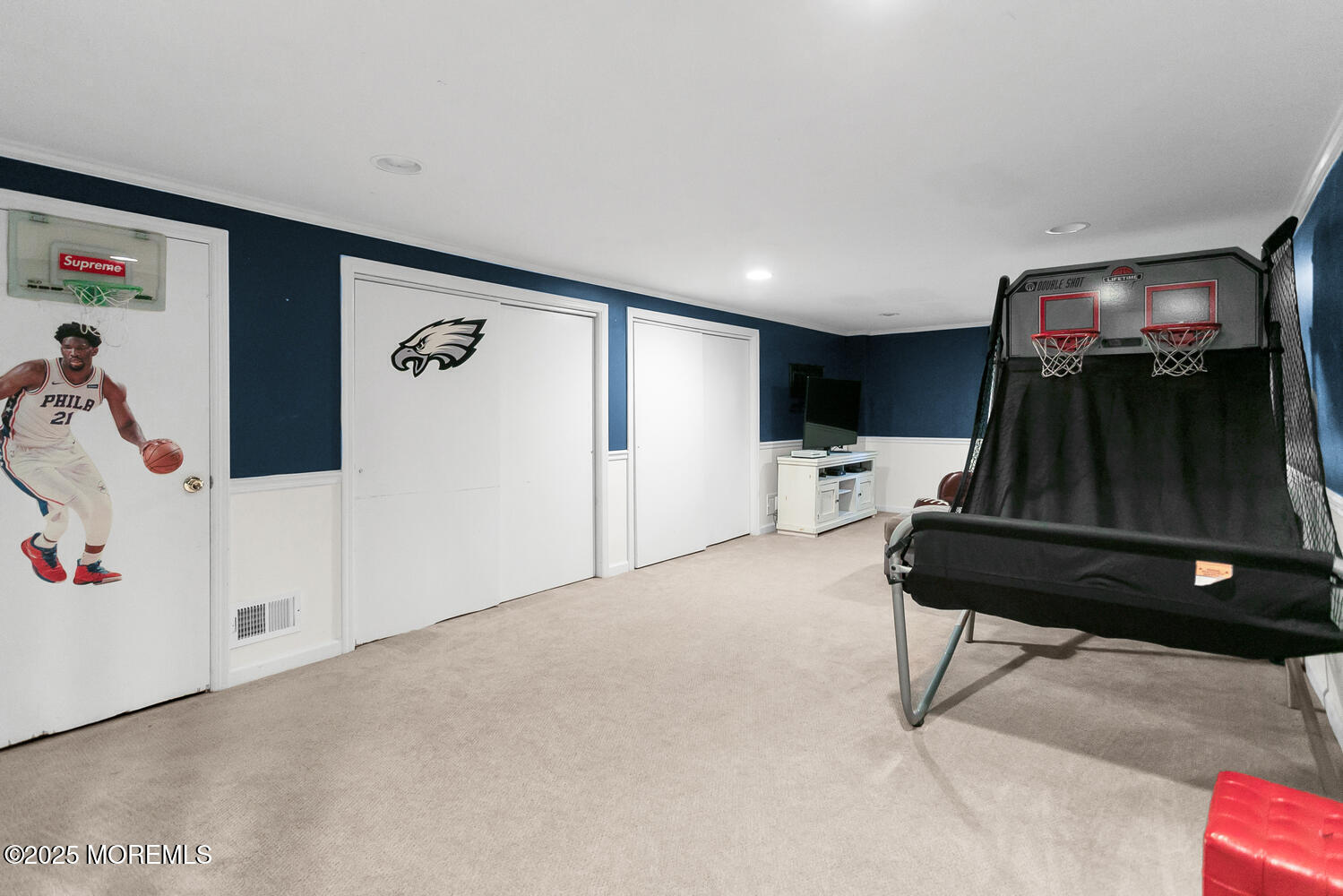 5 Page Drive Red Bank, NJ 07701 - Photo 23 of 27 a living room with furniture and a flat screen tv