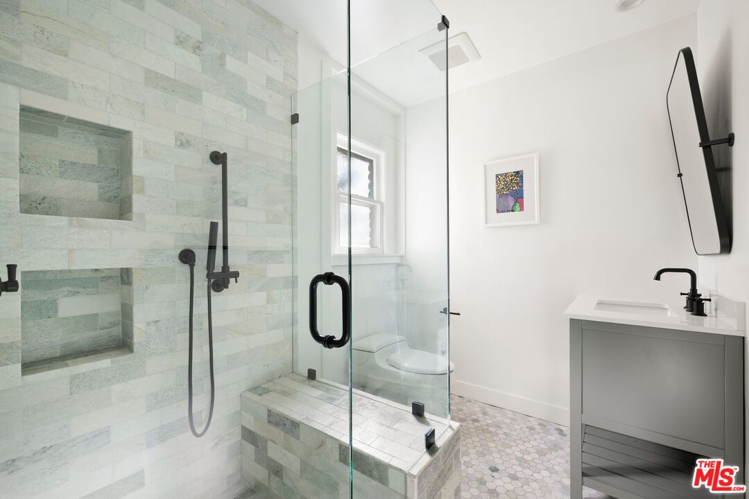 1456 Roscomare Road Los Angeles, CA 90077 - Photo 16 of 21 a bathroom with a shower