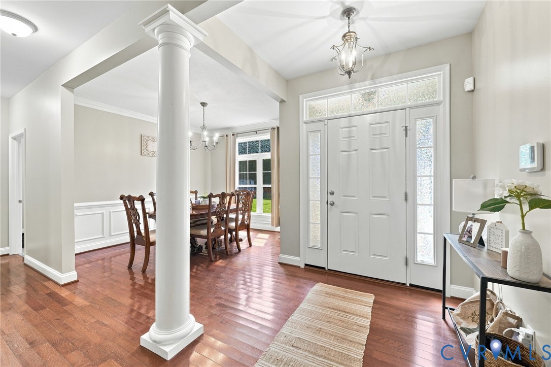 Wood-finish flooring, white paneled double entry d