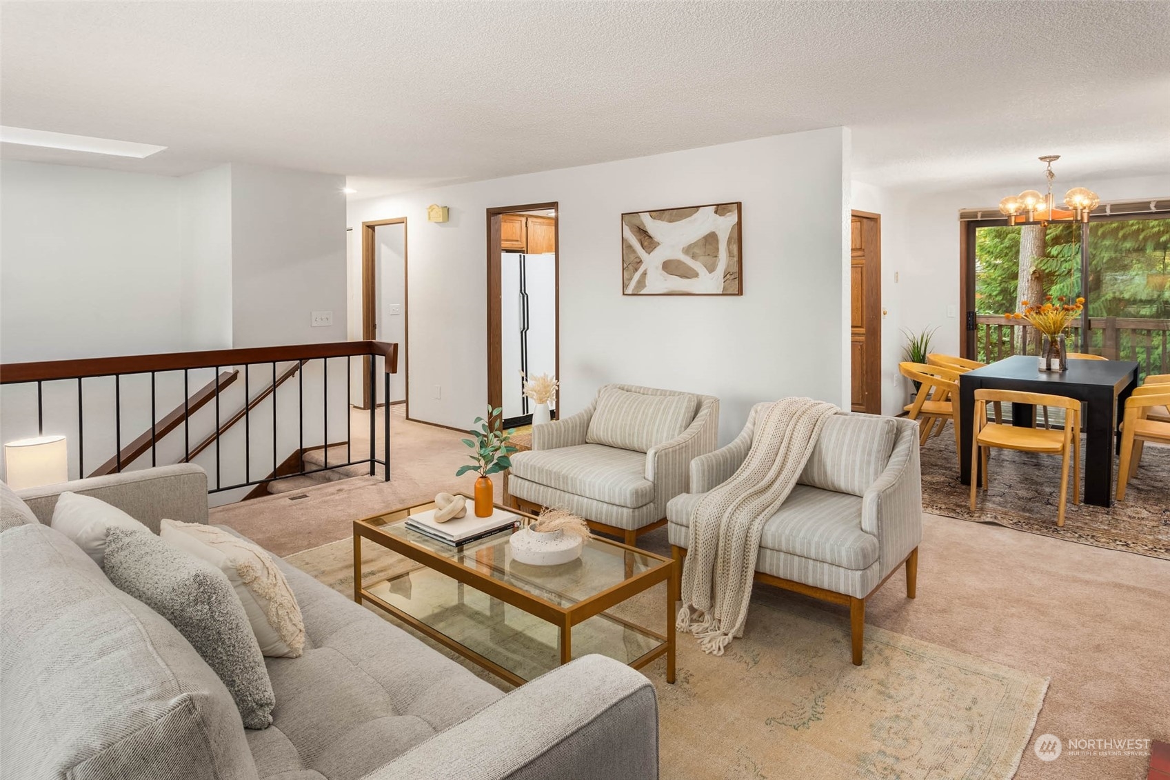 916 104th Place Southeast Everett, WA 98208 - Photo 8 of 32 a living room with furniture stairs and a window