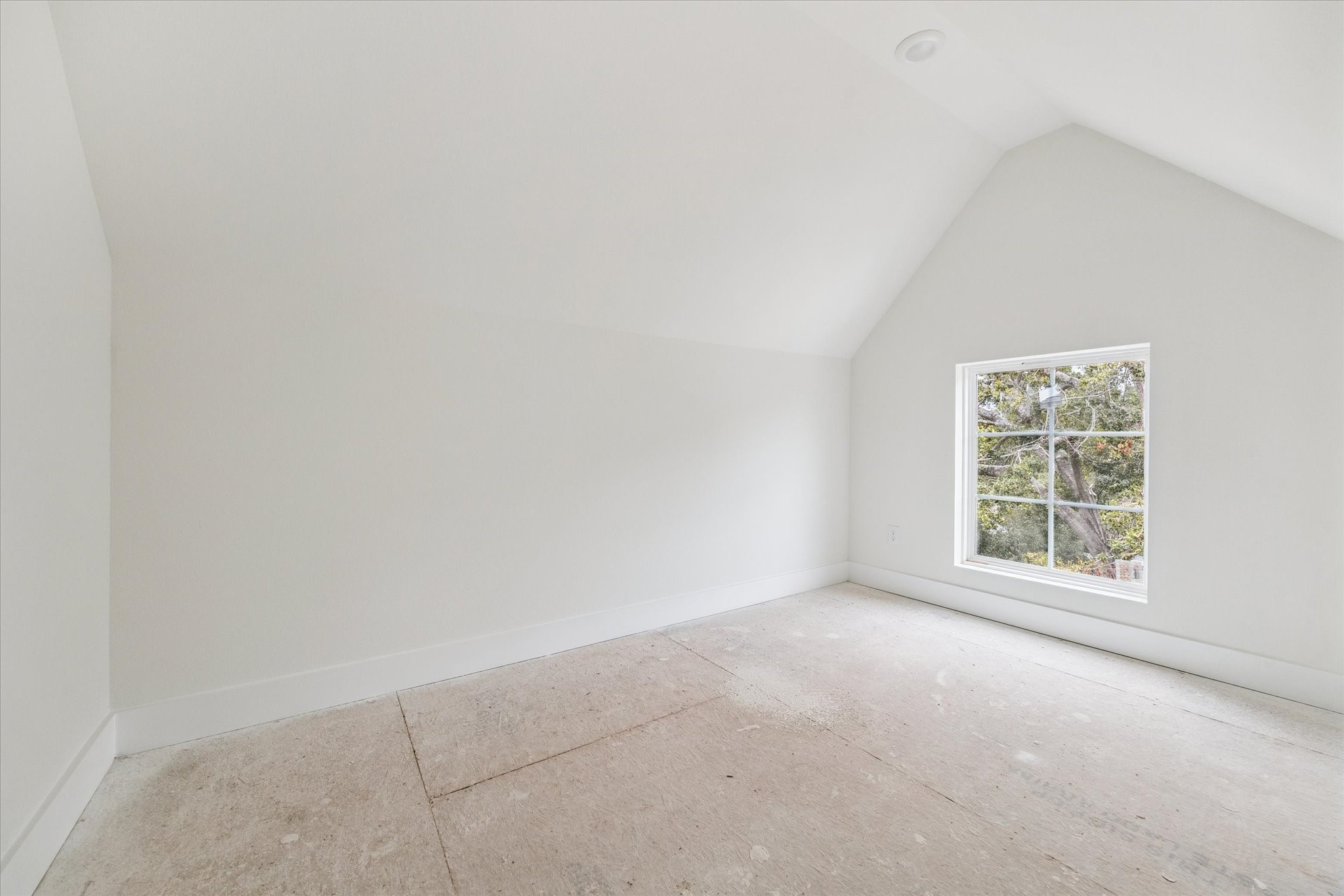 2211 Saxon Drive Houston, TX 77018 - Photo 13 of 32 an empty room with a window