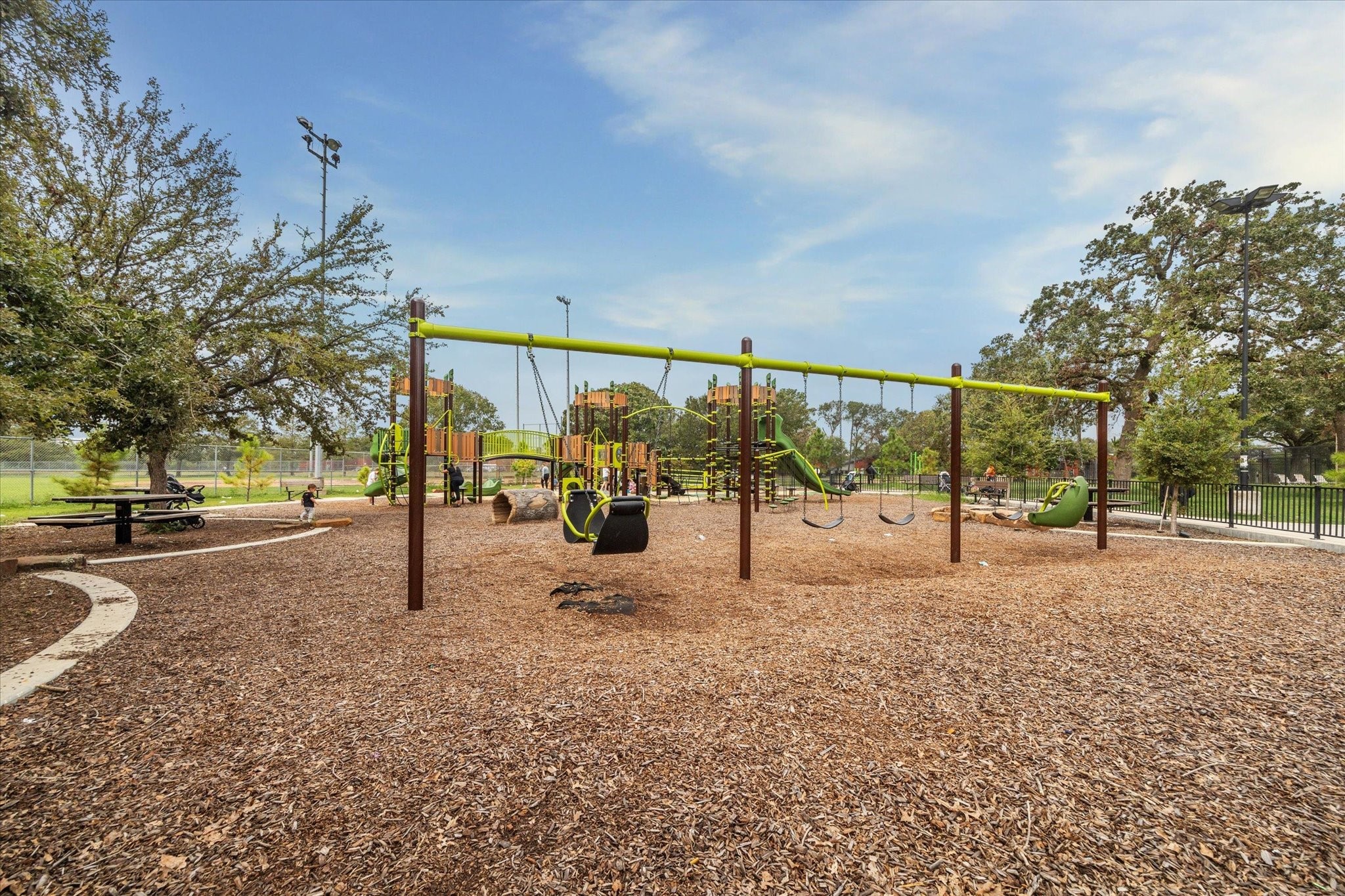 2211 Saxon Drive Houston, TX 77018 - Photo 24 of 32 a view of a road with a yard