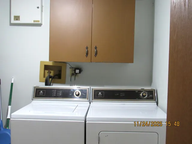 a utility room with dryer and washer