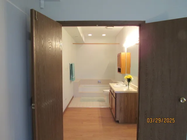 a bathroom with a sink and mirror