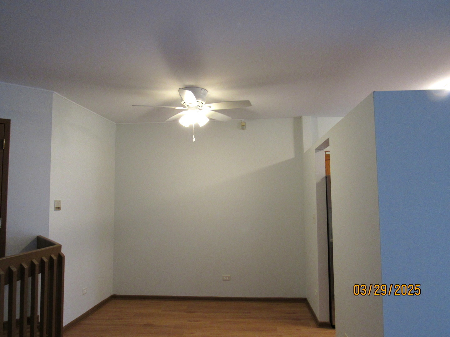 1735 Chesapeake Lane, Unit 7 Schaumburg, IL 60193 - Photo 5 of 22 a view of an empty room with wooden floor